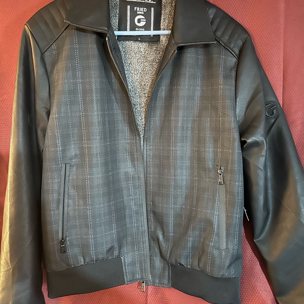 Large Men’s jacket. Fried Denim is the name brand. Never worn; brand new